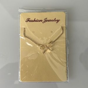 NWT Dainty bow necklace.